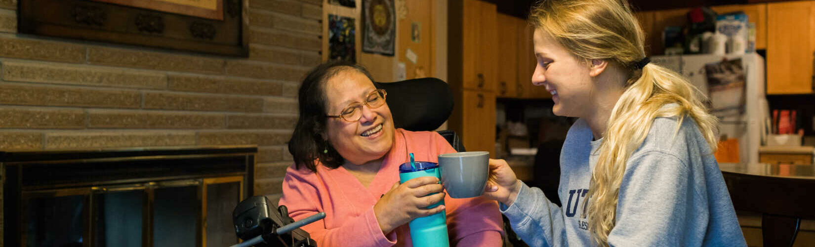 Direct Care worker and resident of ACR Homes staying hydrated and practicing self care